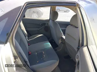 2003 Ford Focus SE z VIN 1FAFP34Z23W257426, wystawiony jako IAAI lot #40736207 z przebiegiem 87 447 mil mil oraz . Historia ofert i sprzedaży dostępna na DreamBid. Obrazek 8.