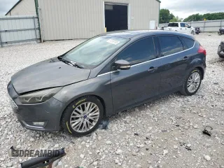 2017 Ford Focus Titanium z VIN 1FADP3N22HL307260, wystawiony jako Copart lot #61399785 z przebiegiem 103 293 mil mil oraz Szkoda całkowita • Salvage title. Historia ofert i sprzedaży dostępna na DreamBid. Obrazek 1.