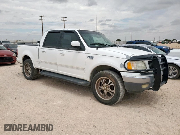 2001 Ford F-150 XLT z VIN 1FTRW08L31KF27329, wystawiony jako Copart lot #61018835 z przebiegiem Nie podano mil oraz Czysty tytuł • Clean title. Historia ofert i sprzedaży dostępna na DreamBid. Obrazek 4.