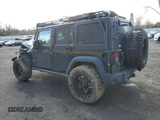 2014 Jeep Wrangler Unlimited Rubicon with VIN 1C4BJWFG1EL195612, listed as a Copart auction lot 47749415 with 35,878 mi miles and Salvage Title. Bid and sale history available at carsss.com. Image 2.