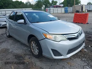 2012 Toyota Camry L z VIN 4T4BF1FK0CR212613, wystawiony jako IAAI lot #42230722 z przebiegiem 219 976 mil mil oraz . Historia ofert i sprzedaży dostępna na DreamBid. Obrazek 1.