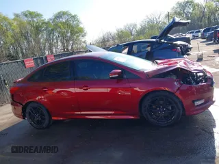 2016 Ford Focus SE with VIN 1FADP3F29GL347574, listed as a IAAI auction lot 41975094 with 76,147 mi miles. Bid and sale history available at carsss.com. Image 13.