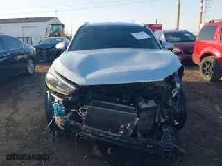 2018 Hyundai Tucson Value with VIN KM8J3CA23JU651464, listed as a IAAI auction lot 41757165 with 72,339 mi miles. Bid and sale history available at carsss.com. Image 13.
