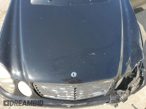 2004 Mercedes-Benz E-Class 3.2L with VIN WDBUF82J14X161148, listed as a Copart auction lot 49736185 with 170,026 mi miles and Salvage Title. Bid and sale history available at carsss.com. Image 12.