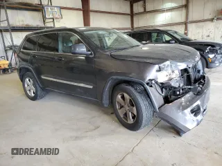 2011 Jeep Grand Cherokee Laredo with VIN 1J4RR4GG6BC657808, listed as a Copart auction lot 55255685 with 86,941 mi miles and Salvage title. Bid and sale history available at DreamBid. Image 4.