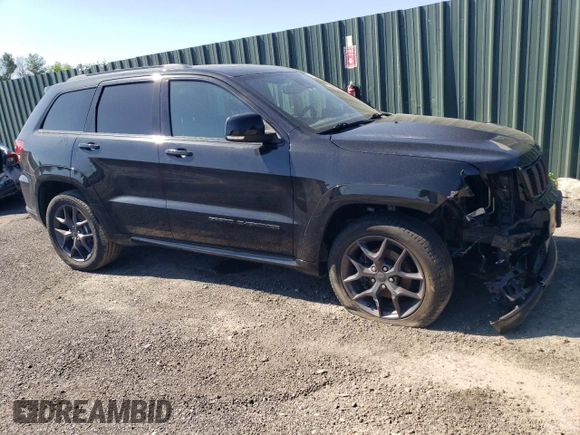 2019 Jeep Grand Cherokee Limited with VIN 1C4RJFBGXKC843402, listed as a Copart auction lot 57148265 with 96,615 mi miles and Salvage title. Bid and sale history available at DreamBid. Image 4.