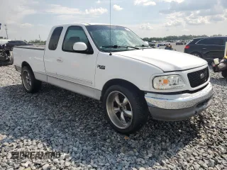 2002 Ford F-150 XL with VIN 1FTRX17272NB01218, listed as a Copart auction lot 61336795 with 201,972 mi miles and Salvage title. Bid and sale history available at DreamBid. Image 4.