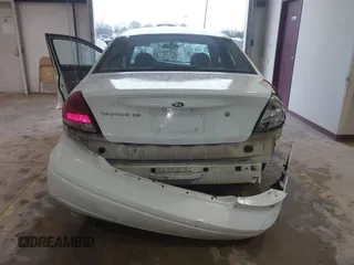 2004 Ford Taurus SE with VIN 1FAFP53UX4A151628, listed as a IAAI auction lot 41727306 with 218,321 mi miles and . Bid and sale history available at carsss.com. Image 6.