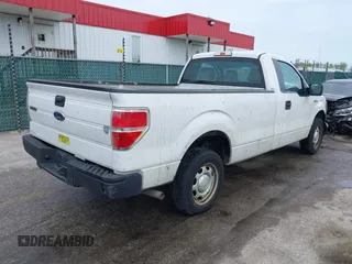 2014 Ford F-150 XL with VIN 1FTMF1CM0EKF70113, listed as a IAAI auction lot 41982424 with 150,007 mi miles. Bid and sale history available at carsss.com. Image 4.