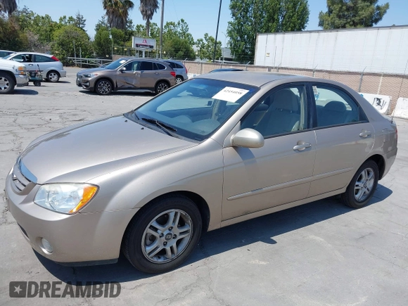 2005 Kia Spectra LX z VIN KNAFE122355118194, wystawiony jako IAAI lot #42454058 z przebiegiem 125 456 mil mil oraz . Historia ofert i sprzedaży dostępna na DreamBid. Obrazek 6.