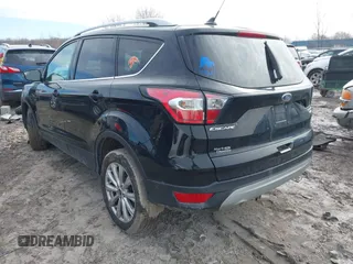 2018 Ford Escape Titanium with VIN 1FMCU0J90JUD17085, listed as a IAAI auction lot 41699687 with Not provided miles and . Bid and sale history available at DreamBid. Image 3.