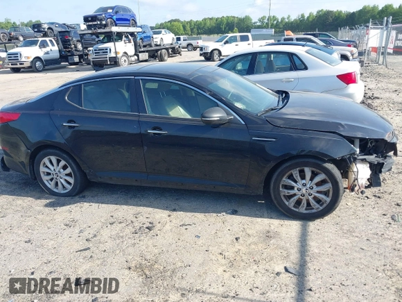2014 Kia Optima EX with VIN 5XXGN4A70EG277871, listed as a IAAI auction lot 42183248 with 128,300 mi miles and . Bid and sale history available at carsss.com. Image 13.