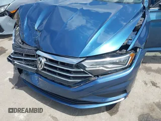 2021 Volkswagen Jetta S z VIN 3VWC57BU6MM046066, wystawiony jako IAAI lot #42199064 z przebiegiem 86 394 mil mil oraz . Historia ofert i sprzedaży dostępna na DreamBid. Obrazek 17.