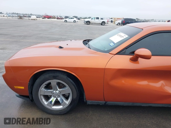 2011 Dodge Challenger z VIN 2B3CJ4DG9BH602419, wystawiony jako IAAI lot #40753257 z przebiegiem 124 282 mil mil oraz . Historia ofert i sprzedaży dostępna na DreamBid. Obrazek 18.