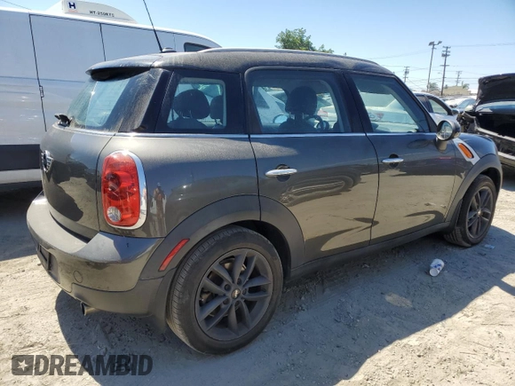 2014 MINI Countryman with VIN WMWZB3C54EWR39731, listed as a Copart auction lot 63635215 with 85,751 mi miles and Salvage title. Bid and sale history available at DreamBid. Image 3.