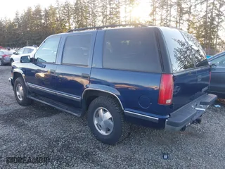 1997 Chevrolet Tahoe with VIN 1GNEK13R4VJ418974, listed as a IAAI auction lot 41560411 with 198,170 mi miles. Bid and sale history available at carsss.com. Image 3.