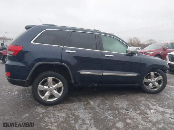 2012 Jeep Grand Cherokee Overland with VIN 1C4RJFCT9CC182216, listed as a IAAI auction lot 41490446 with 153,237 mi miles. Bid and sale history available at carsss.com. Image 13.
