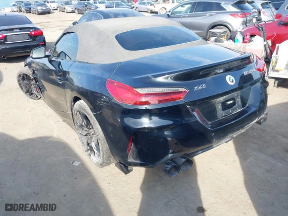 2022 BMW Z4 sDriveM40i with VIN WBAHF9C08NWX38258, listed as a IAAI auction lot 41462157 with 43,534 mi miles. Bid and sale history available at carsss.com. Image 3.