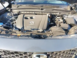 2024 Mazda CX-50 S Premium with VIN 7MMVABDM1RN201756, listed as a IAAI auction lot 41282874 with 2,019 mi miles and . Bid and sale history available at DreamBid. Image 10.