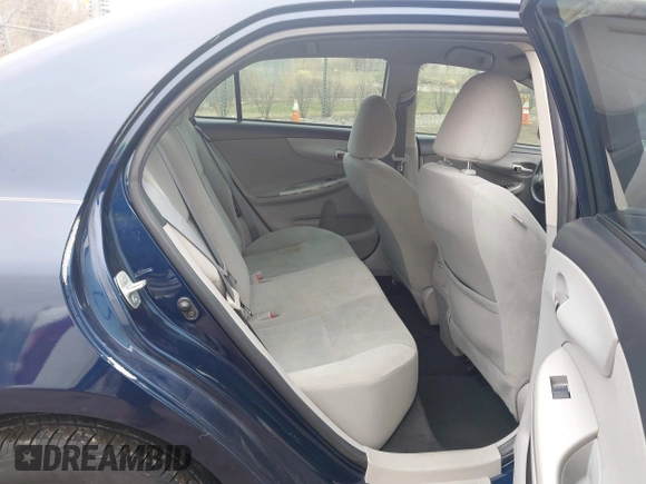 2012 Toyota Corolla L with VIN 5YFBU4EE4CP031190, listed as a IAAI auction lot 42015131 with 210,689 mi miles. Bid and sale history available at carsss.com. Image 8.