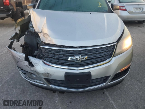 2013 Chevrolet Traverse LS with VIN 1GNKVFED9DJ124042, listed as a Copart auction lot 83077294 with 102,812 mi miles and Salvage Title. Bid and sale history available at DreamBid. Image 12.