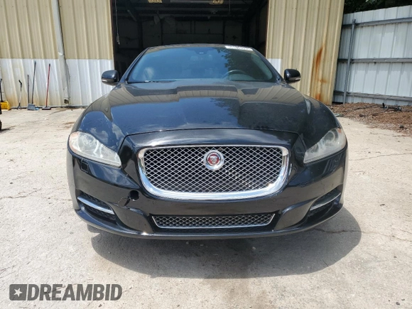 2015 Jaguar XJ с VIN SAJWJ1CD9F8V83885, выставлен на аукционе Copart как лот 58016335 с пробегом 81 794 миль миль и Чистый • Clean title. История ставок и продаж доступна на DreamBid. Изображение 5.