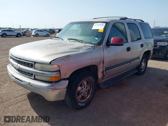 2004 Chevrolet Tahoe LS with VIN 1GNEC13V44R169943, listed as a IAAI auction lot 42753658 with 175,766 mi miles and . Bid and sale history available at DreamBid. Image 2.