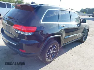 2018 Jeep Grand Cherokee Limited with VIN 1C4RJFBT7JC408526, listed as a IAAI auction lot 42103419 with 103,873 mi miles and . Bid and sale history available at DreamBid. Image 4.