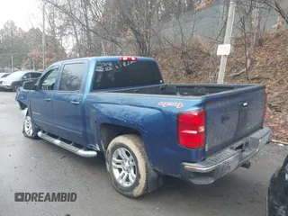 2015 Chevrolet Silverado 1500 LT with VIN 3GCUKREC5FG468054, listed as a IAAI auction lot 41459655 with 157,236 mi miles. Bid and sale history available at carsss.com. Image 3.
