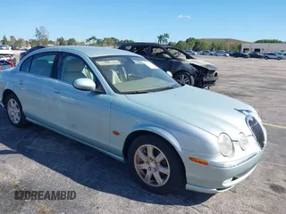 2004 Jaguar S-Type with VIN SAJEA01T04FM99124, listed as a IAAI auction lot 41839768 with 41,307 mi miles and . Bid and sale history available at DreamBid. Image 1.