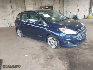 2016 Ford C-Max Energi SEL with VIN 1FADP5CU1GL100812, listed as a IAAI auction lot 41259017 with 138,227 mi miles. Bid and sale history available at carsss.com. Image 1.