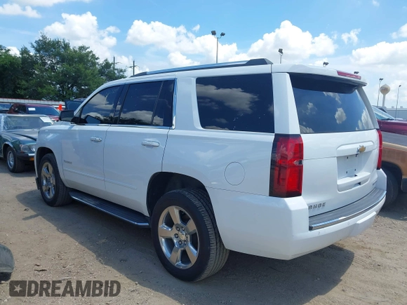 2020 Chevrolet Tahoe LTZ with VIN 1GNSCCKCXLR215899, listed as a IAAI auction lot 40128171 with 109,541 mi miles and . Bid and sale history available at DreamBid. Image 3.