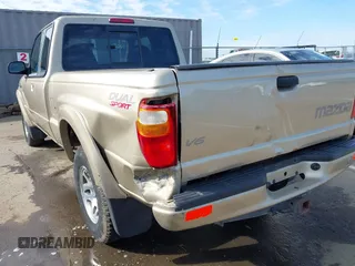 2002 Mazda B-Series 2WD Truck DS with VIN 4F4YR16U52TM18118, listed as a IAAI auction lot 41563022 with 126,136 mi miles. Bid and sale history available at carsss.com. Image 6.