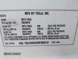 2024 Tesla Model Y with VIN 7SAYGDED2RF089010, listed as a IAAI auction lot 41630222 with 18,366 mi miles and . Bid and sale history available at carsss.com. Image 9.