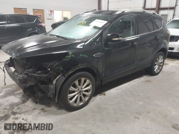 2017 Ford Escape Titanium with VIN 1FMCU9J9XHUB51401, listed as a IAAI auction lot 41025642 with 77,908 mi miles. Bid and sale history available at carsss.com. Image 17.