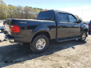 2003 Ford F-150 XLT with VIN 1FTRW08L63KB47470, listed as a Copart auction lot 50400055 with 223,859 mi miles and Salvage Title. Bid and sale history available at carsss.com. Image 3.