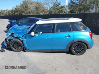 2019 MINI Hardtop 4 Door Cooper with VIN WMWXU1C53K2J02378, listed as a IAAI auction lot 41297292 with 26,594 mi miles and . Bid and sale history available at DreamBid. Image 15.