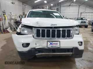 2013 Jeep Grand Cherokee Overland with VIN 1C4RJFCT1DC586886, listed as a IAAI auction lot 41941590 with 125,126 mi miles. Bid and sale history available at carsss.com. Image 12.