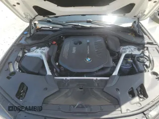 2018 BMW 5 Series 540i with VIN WBAJE5C58JWA96615, listed as a Copart auction lot 56117205 with 87,211 mi miles and Salvage title. Bid and sale history available at DreamBid. Image 11.