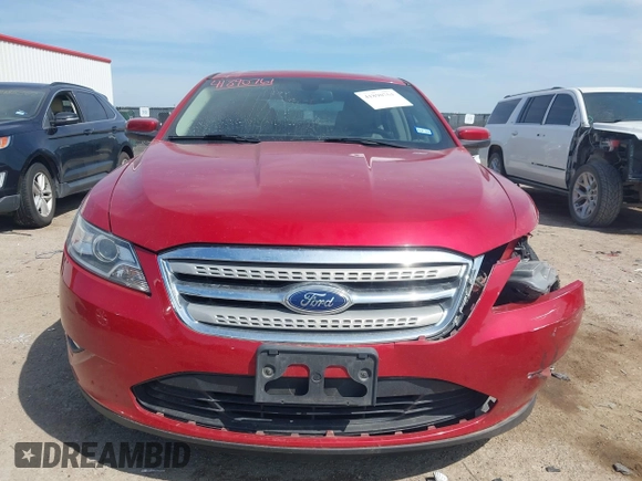 2011 Ford Taurus SEL z VIN 1FAHP2EW7BG123740, wystawiony jako IAAI lot #41890761 z przebiegiem 132 310 mil mil oraz . Historia ofert i sprzedaży dostępna na DreamBid. Obrazek 13.