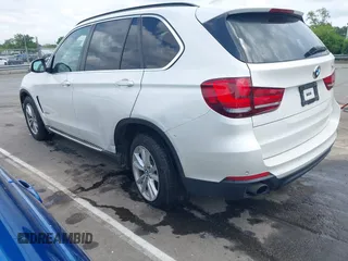 2014 BMW X5 sDrive35i z VIN 5UXKR2C54E0H34800, wystawiony jako IAAI lot #42110978 z przebiegiem 106 891 mil mil oraz . Historia ofert i sprzedaży dostępna na DreamBid. Obrazek 6.