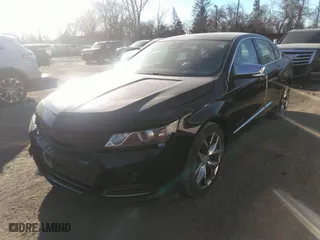 2014 Chevrolet Impala LTZ with VIN 1G1145SLXEU148131, listed as a IAAI auction lot 41234896 with 124,304 mi miles. Bid and sale history available at carsss.com. Image 2.