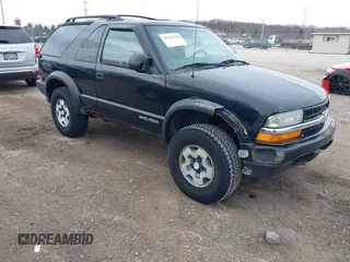 2001 Chevrolet Blazer LS z VIN 1GNCT18W51K220881, wystawiony jako IAAI lot #42124554 z przebiegiem 121 254 mil mil oraz . Historia ofert i sprzedaży dostępna na DreamBid. Obrazek 1.