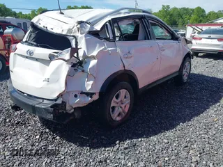 2013 Toyota RAV4 LE with VIN JTMBFREV7DD002763, listed as a IAAI auction lot 42286753 with 125,022 mi miles and . Bid and sale history available at DreamBid. Image 4.