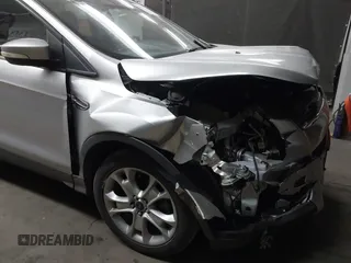 2015 Ford Escape Titanium with VIN 1FMCU0J96FUB81598, listed as a IAAI auction lot 41872114 with 122,001 mi miles and . Bid and sale history available at DreamBid. Image 6.