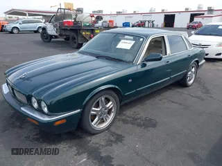 2003 Jaguar XJ with VIN SAJDA15B73MF53499, listed as a IAAI auction lot 41896445 with 95,055 mi miles and . Bid and sale history available at DreamBid. Image 2.