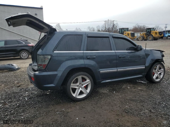 2007 Jeep Grand Cherokee SRT-8 with VIN 1J8HR78367C658164, listed as a Copart auction lot 82672764 with 75,272 mi miles and Salvage Title. Bid and sale history available at carsss.com. Image 3.