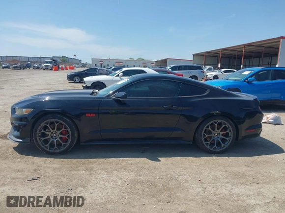 2015 Ford Mustang GT z VIN 1FA6P8CF1F5327142, wystawiony jako IAAI lot #41909056 z przebiegiem 105 798 mil mil oraz . Historia ofert i sprzedaży dostępna na DreamBid. Obrazek 14.