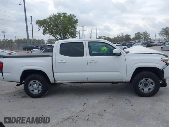 2022 Toyota Tacoma SR with VIN 3TMCZ5AN7NM470444, listed as a IAAI auction lot 41729041 with 34,248 mi miles and . Bid and sale history available at DreamBid. Image 14.