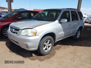 2005 Mazda Tribute S with VIN 4F2YZ06155KM61960, listed as a IAAI auction lot 42069266 with 192,284 mi miles and . Bid and sale history available at carsss.com. Image 2.